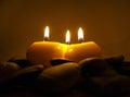 Romantic Candles on Sea Stones Royalty Free Stock Photo