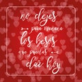 Phrase about love in red hearts bokeh background. Romantic card. Lettering element. Text in Spanish