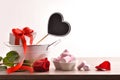 Romantic celebration with gift rose and jelly beans isolated white