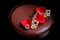 Romantic chocolate raspberry cake with rose petals, white chocolate decorations and fresh berries Royalty Free Stock Photo