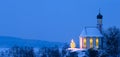 Romantic christmas chapel with illuminated tree