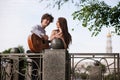 Romantic city date couple guitar music concept