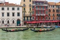 Venice, the city of the lagoon, of the canals, and of carnival masks. Famous throughout the world. Gondola and gondolier.