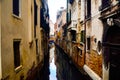 Small tight canal at romantic city of Venice