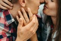 Romantic close-up portrait of the sensitive couple rubbing noses. The lovely girl is softly stroking the cheek of the Royalty Free Stock Photo