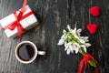 Romantic coffee with flowers and a present Royalty Free Stock Photo