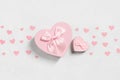 Romantic composition with pink gift boxes in the shape of hearts on a white background. Valentines day, mothers day, birthday Royalty Free Stock Photo