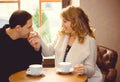 Romantic concept with man and woman at cafe Royalty Free Stock Photo