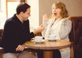 Romantic concept with man and woman at cafe Royalty Free Stock Photo