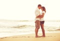 Romantic Couple on the Beach at Sunset. Royalty Free Stock Photo