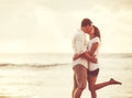 Romantic Couple on the Beach at Sunset. Royalty Free Stock Photo