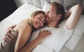 Romantic couple in bed Royalty Free Stock Photo