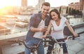 Romantic couple with bicycles in the city Royalty Free Stock Photo