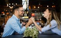 Romantic couple in cafe having date and enjoying being together. Royalty Free Stock Photo