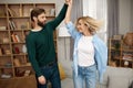 Romantic Couple Dancing Home. Playful Spouses in Casual Clothing Dancing Royalty Free Stock Photo