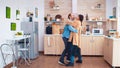 Romantic couple dancing in kitchen