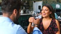 Romantic Couple On Date In Restaurant Bar Doing Cheers With Wine Royalty Free Stock Photo