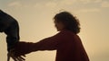 Romantic couple dating on beach at sunrise. Loving woman and man holding hands Royalty Free Stock Photo