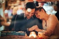 Romantic couple dating in pub Royalty Free Stock Photo