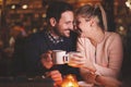 Romantic couple dating in pub Royalty Free Stock Photo