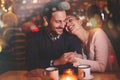 Romantic couple dating in pub Royalty Free Stock Photo