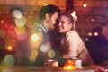 Romantic couple dating in pub Royalty Free Stock Photo