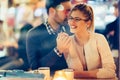 Romantic couple dating in pub at night Royalty Free Stock Photo