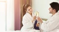 Romantic couple drinking champagne in bed Royalty Free Stock Photo