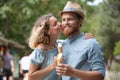 romantic couple eating ice cream at park Royalty Free Stock Photo