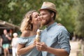 romantic couple eating ice cream at park Royalty Free Stock Photo