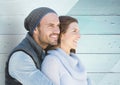 Romantic couple embracing each other against wooden background Royalty Free Stock Photo