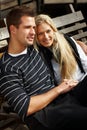 Romantic couple enjoying autumn sun in park Royalty Free Stock Photo