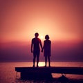 Romantic Couple Enjoying Sunset at Sea. Royalty Free Stock Photo