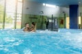 Romantic couple enjoying thermal bath spa and wellness center Royalty Free Stock Photo