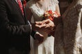 Romantic couple exchanging rings during wedding ceremony in chur Royalty Free Stock Photo