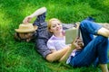 Romantic couple family enjoy leisure with poetry or literature grass background. Couple soulmates at romantic date Royalty Free Stock Photo