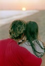 Romantic couple with goblet of wine on a beach Royalty Free Stock Photo