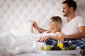 Romantic couple having breakfast in bed Royalty Free Stock Photo