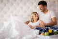 Romantic couple having breakfast in bed Royalty Free Stock Photo