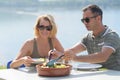 romantic couple having lunch outdoor Royalty Free Stock Photo