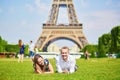 Romantic couple having near the Eiffel tower in Paris