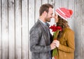 Romantic couple holding bunch of flowers rubbing nose Royalty Free Stock Photo