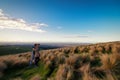 Romantic couple holding each other in natural landscape