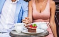 Romantic couple holding hands. Couple in having coffee in cafe. Drinking coffee. Happy romantic couple sitting in a cafe Royalty Free Stock Photo