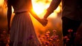 Romantic couple holding hands walking through picturesque lavender field on a sunny day Royalty Free Stock Photo