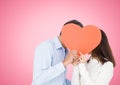 Romantic couple holding heart shape and kissing each other Royalty Free Stock Photo