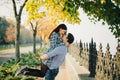 Romantic couple kissing in autumn park Royalty Free Stock Photo