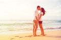 Romantic Couple Kissing on the Beach at Sunset Royalty Free Stock Photo