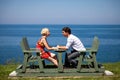 Romantic couple sitting on the bench Royalty Free Stock Photo