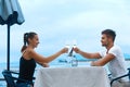 Romantic Couple In Love Having Dinner At Sea Beach Restaurant Royalty Free Stock Photo